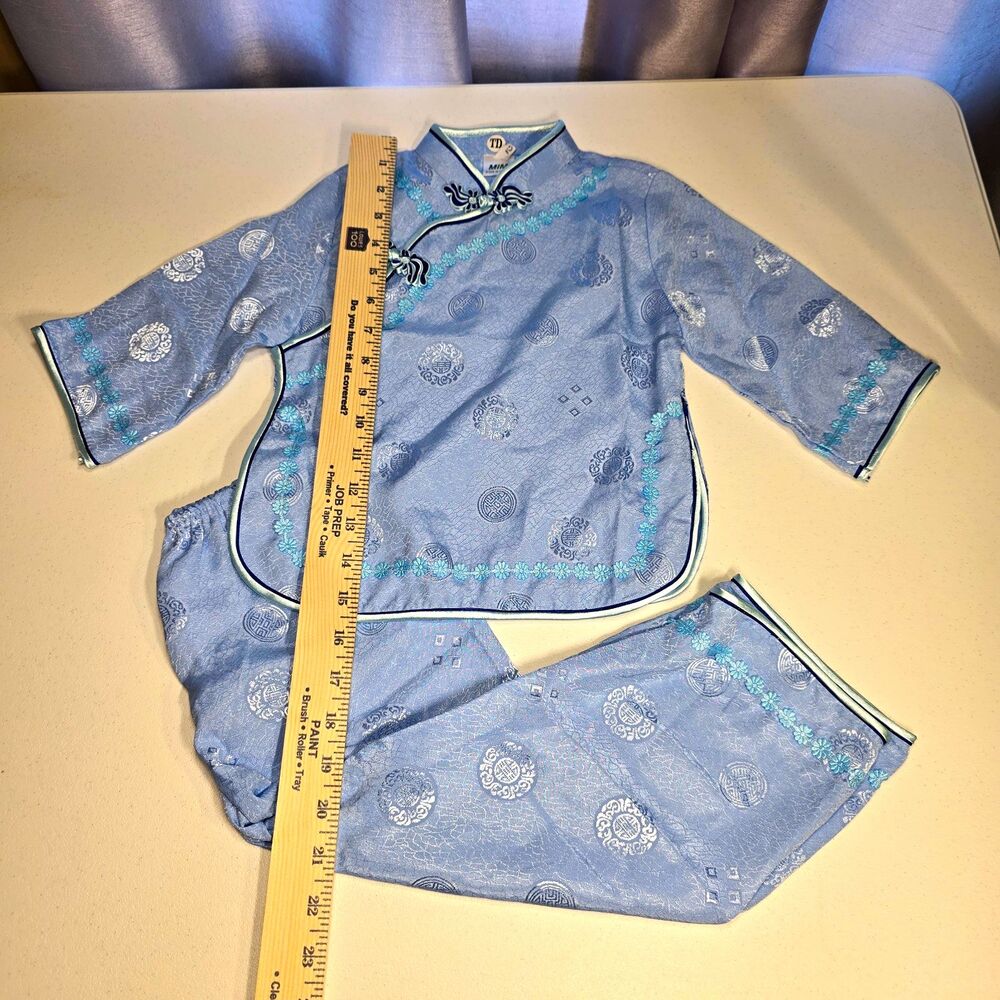 light blue traditional Chinese children's brocade tang suit and matching pants